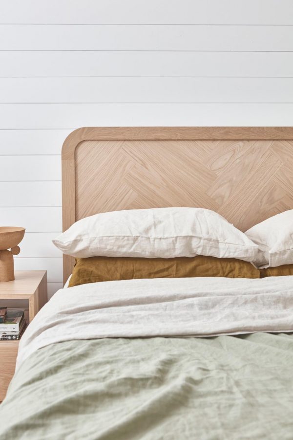 Timber bed head with a herringbone design