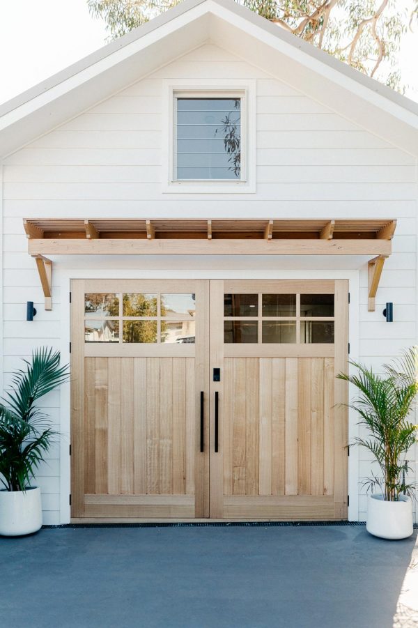 Two of the Avenue Solid timber entrance doors at the entrance of this coastal design home