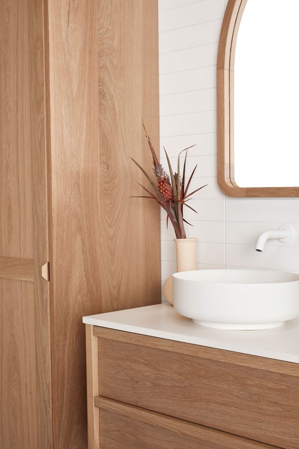Shaker door profile bathroom storage alongside a timber bathroom vanity