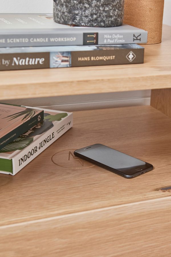 Norah timber bedside tables have a built in phone charger