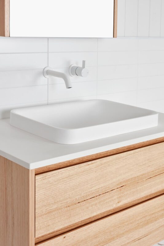 White rectanglar semi inset basin in a timber vanity | Loughlin Furniture Bathroom Vanities