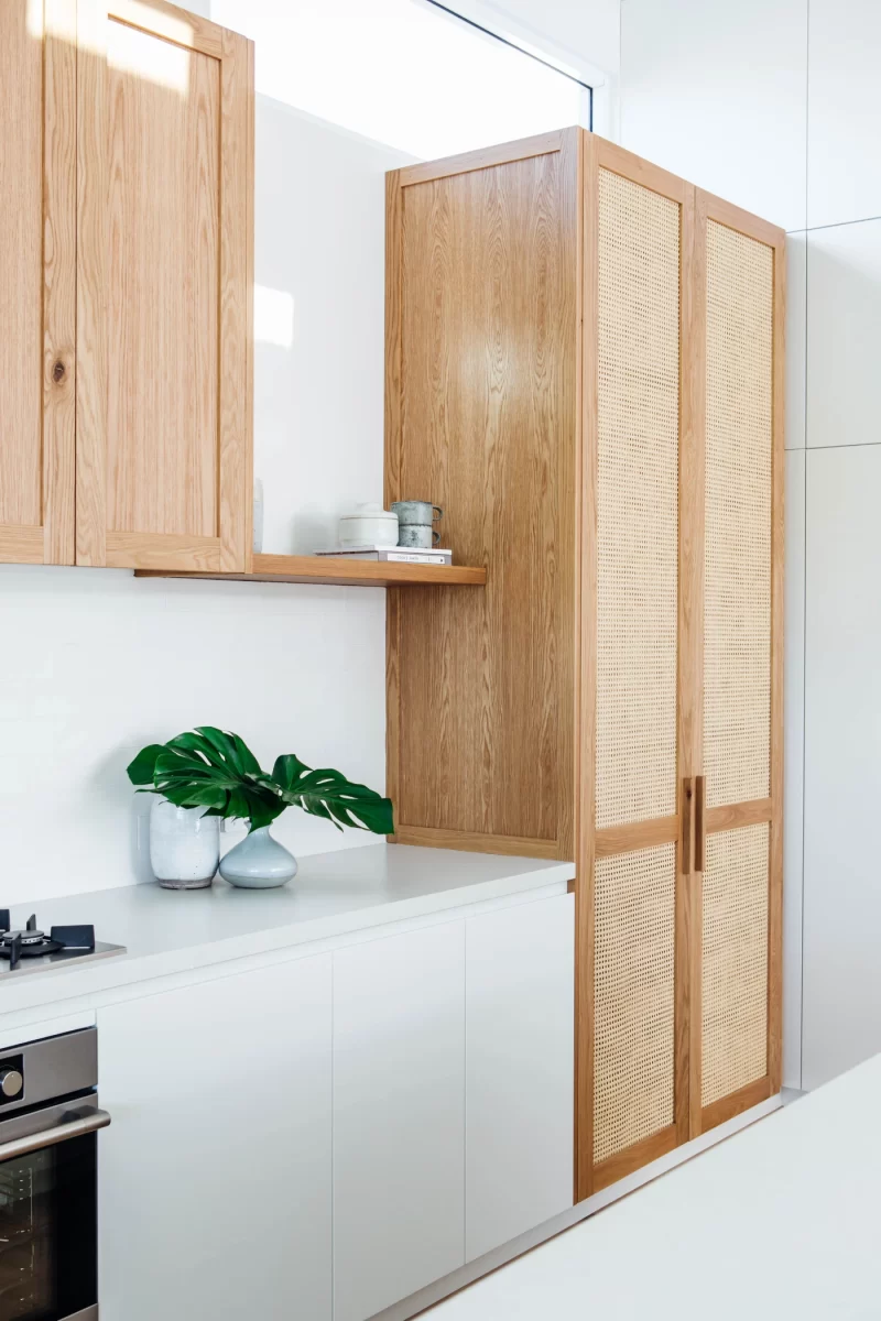 Australian made timber doors | Rattan kitchen doors in a coastal kitchen