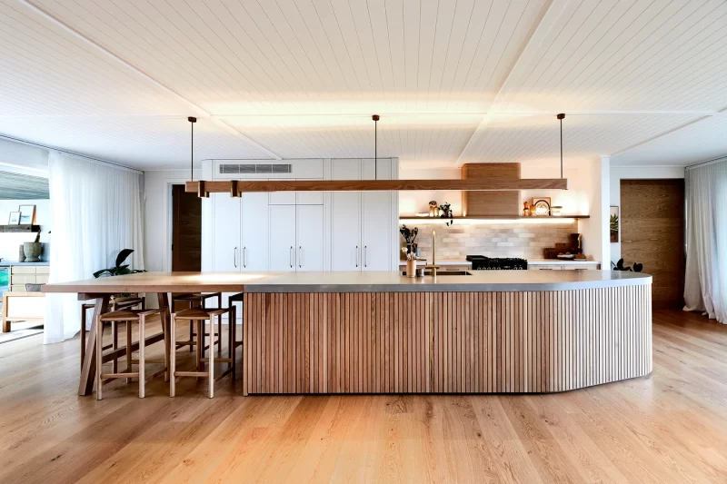 Island bench featuring in the timber kitchen| Open plan Kitchen | Hand crafted timber kitchen | Australian made timber cabinetry