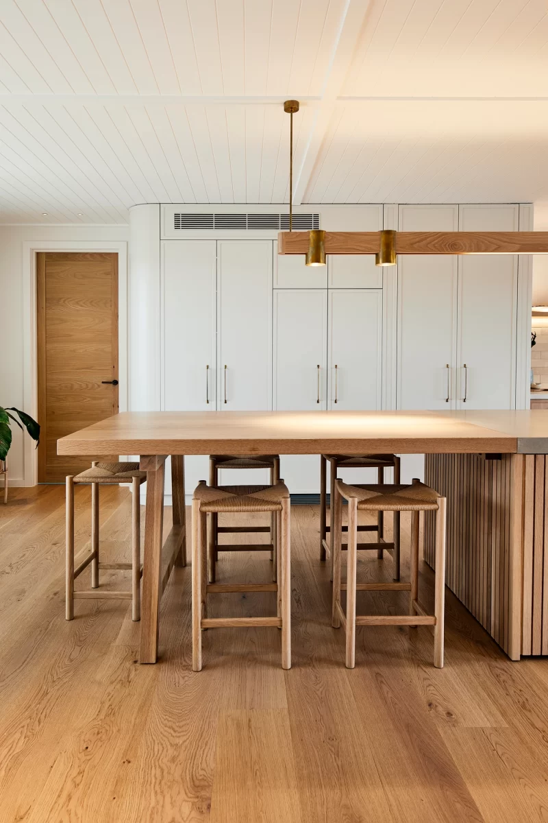 Island bench featuring in the timber kitchen with white timber cabinetry | Hand crafted timber kitchen | Australian made timber cabinetry
