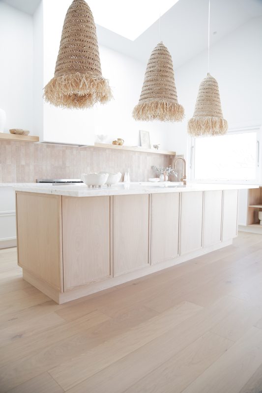 Banksia Lane chose our 30mm shaker style panels in American Oak light for their light filled kitchen.