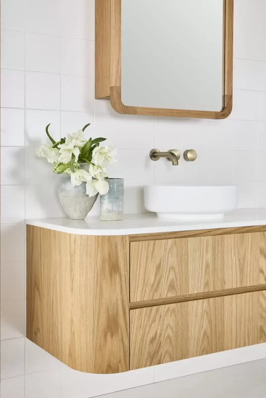 Curved end of Evans Valley Vanity pictured in American Oak Natural