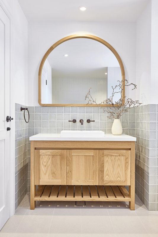 Freo freestanding vanity with Alura Arch mirror