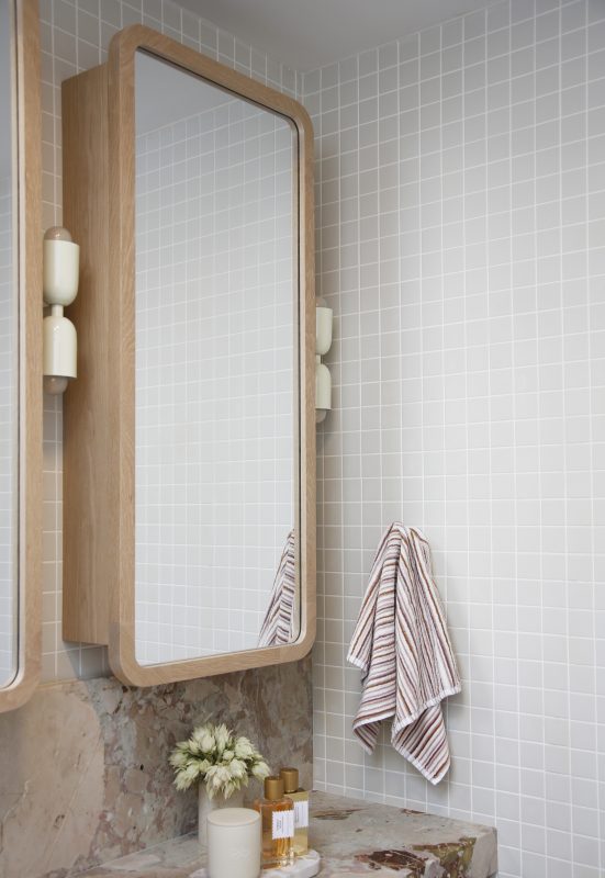 Custom twin Alura mirror cabinets in American Oak light